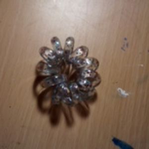 Blue with rainbow glitter squncie like thing Blue